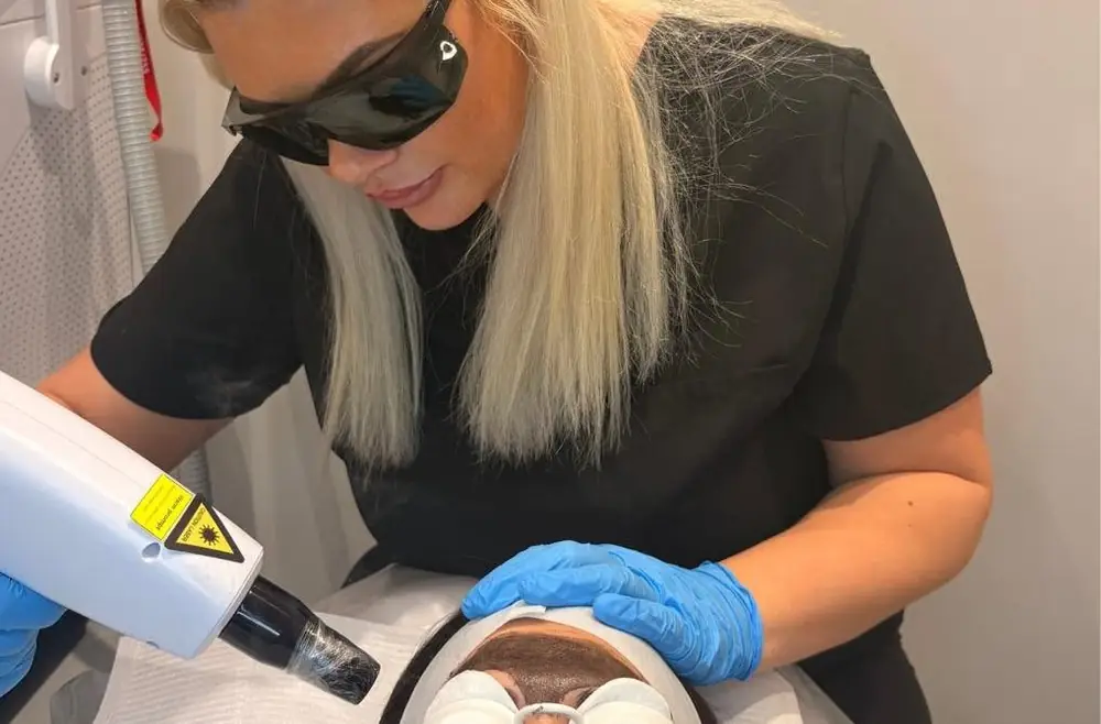 Laser skin treatment with protective eyewear